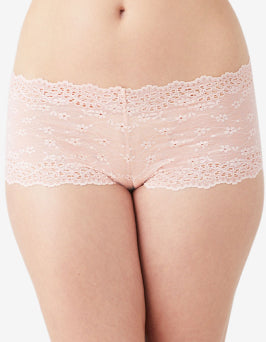 Boyshort worn by a model on a plain background